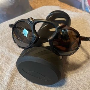 New in box Oakley “Mad Man “ sunglasses. Pewter frame color, never worn!